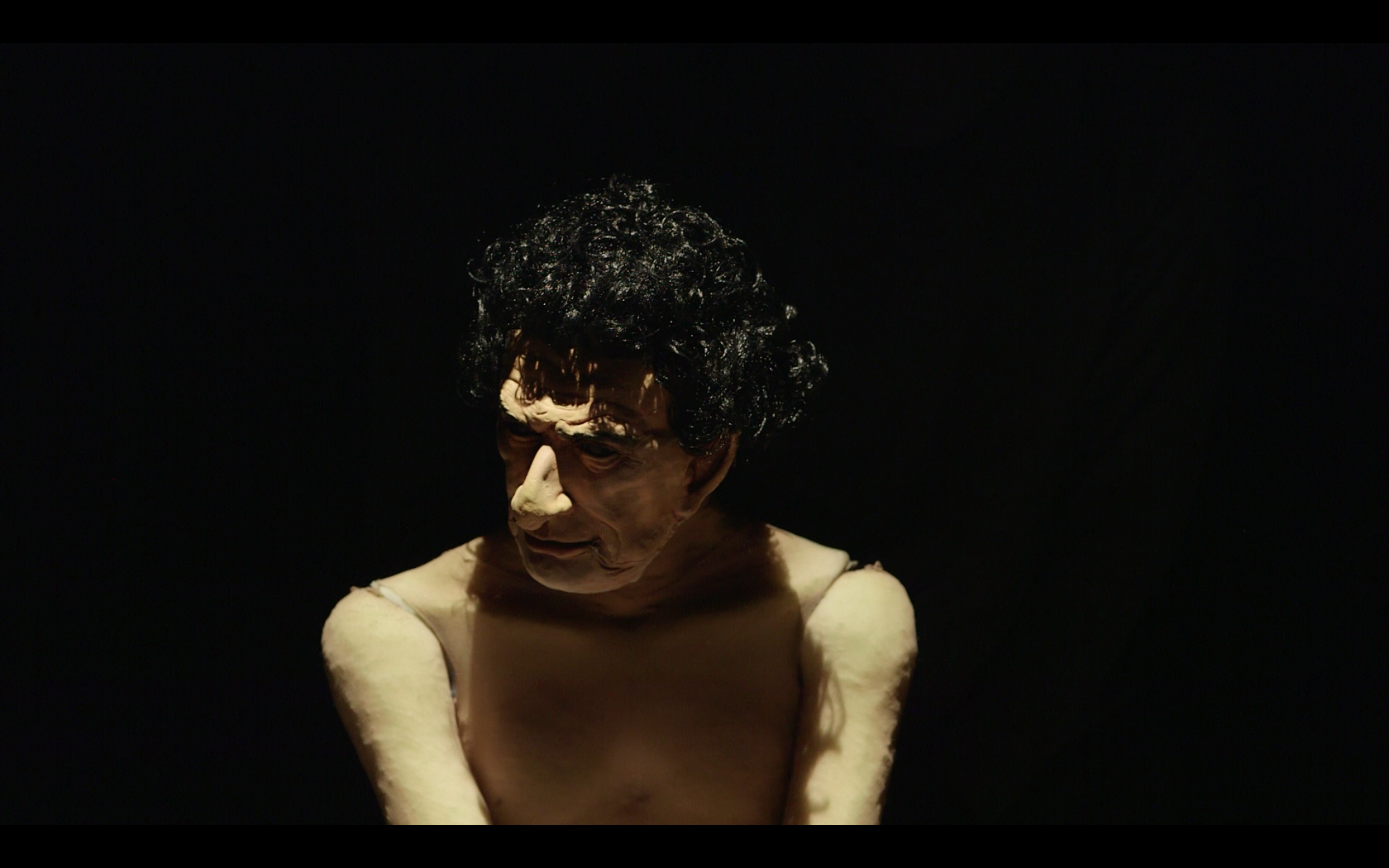 A performer with a figure from PROTOTYPE